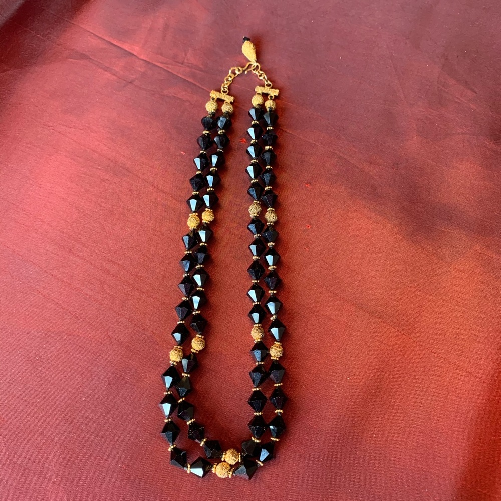 Vintage glass and gold tone bead necklace.